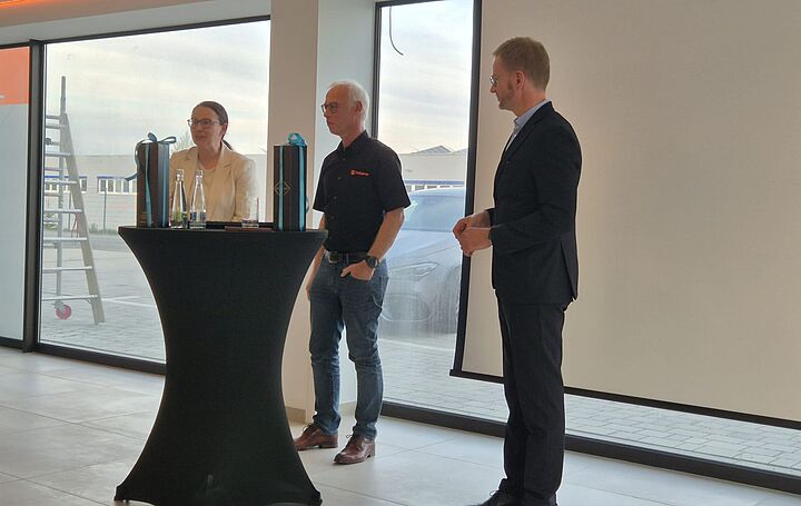 Ms. Schindele with Mr. Finkbeiner and Mr. Holznagel